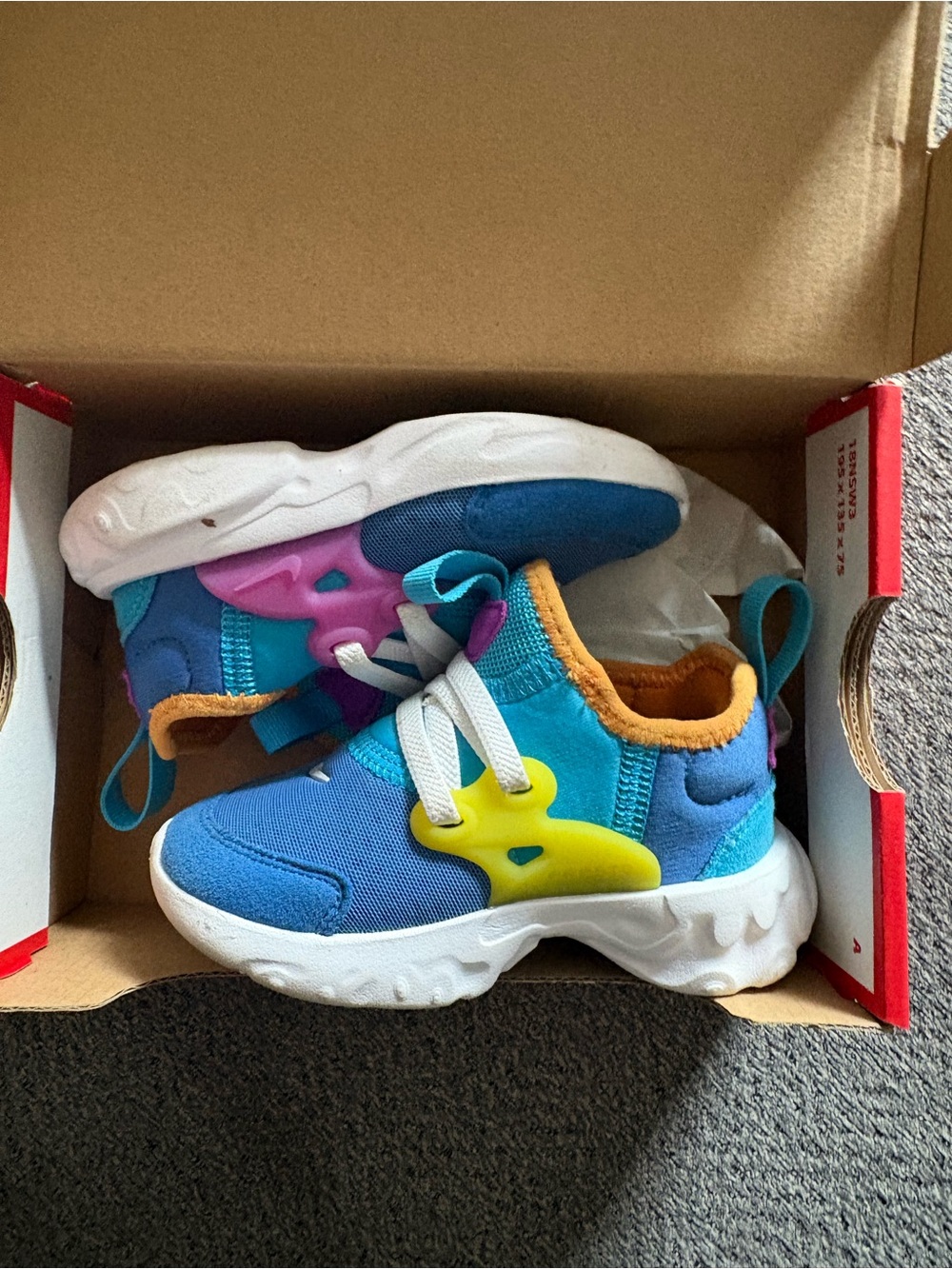 Nike Blue Turquoise Kids Sneakers with Yellow & Pink Accents